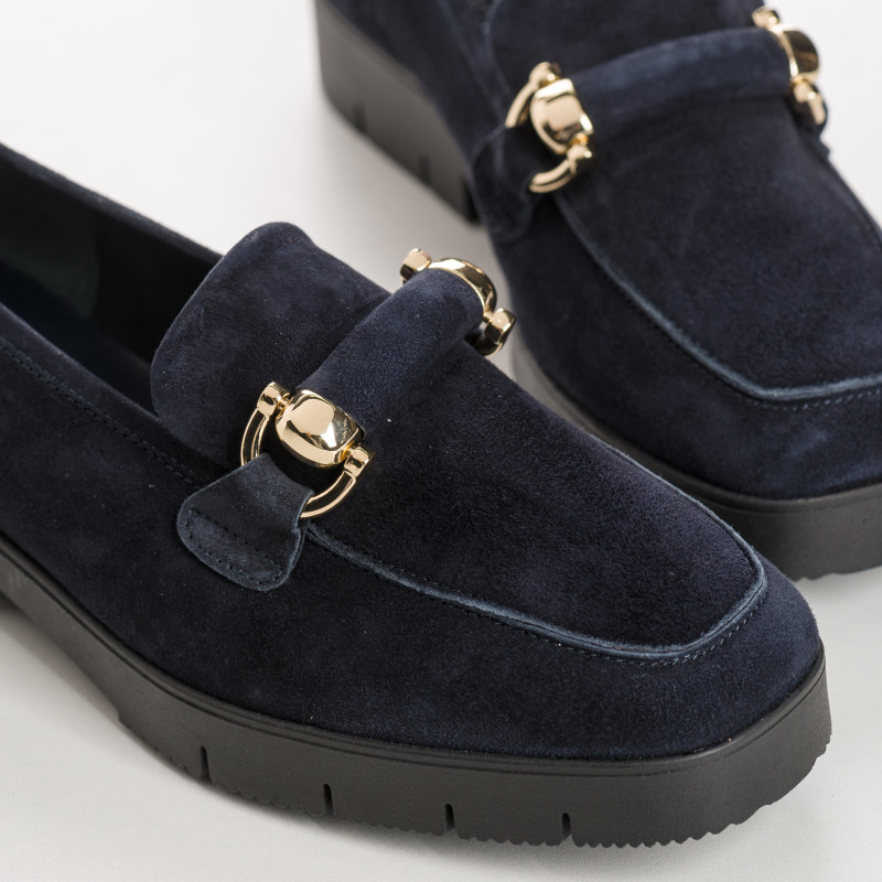Suede moccasins with notched soles and golden accessories