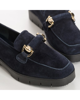 Suede moccasins with notched soles and golden accessories