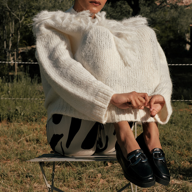 Leather compensated loafers with golden or silver accessories