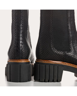 Boots Chelsea noires en cuir embossé python avec élastiques