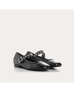 Black leather mary janes with eyelet flanges and silver loops