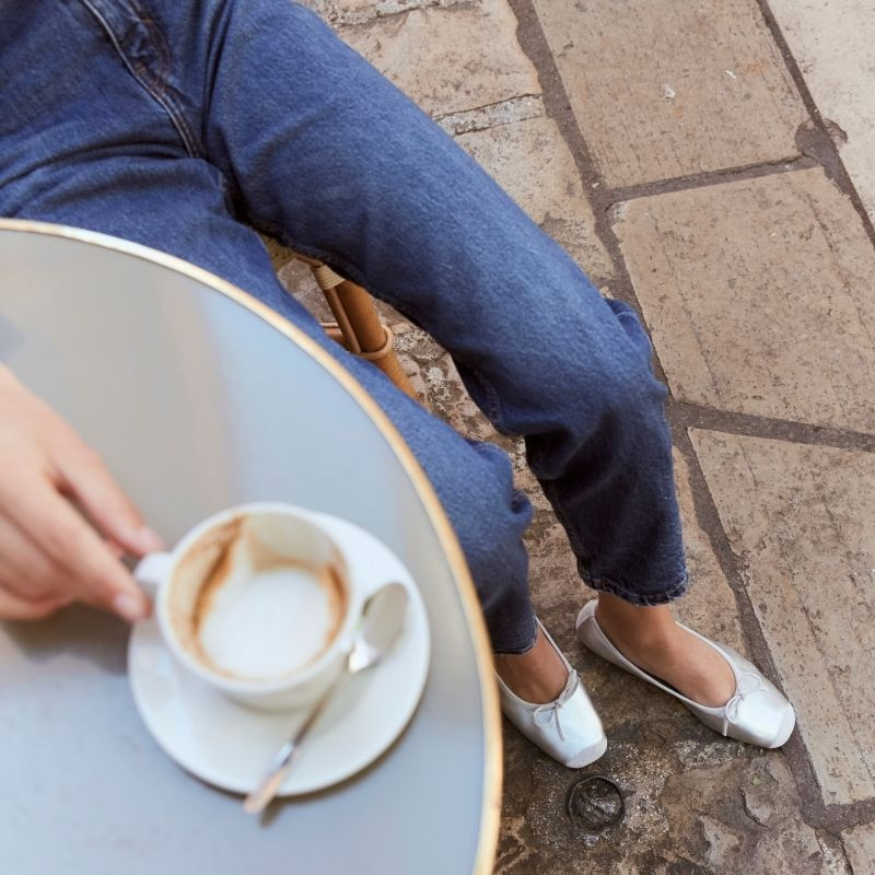 Flat ballerinas with metallic leather knot