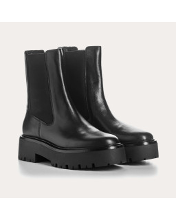 Boots Chelsea noires en cuir avec élastiques