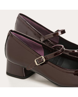 Mary Janes with polished leather heels with silver buckle